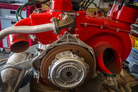 A close up of a red engine in a garage photo – Free Solingen Image on ...