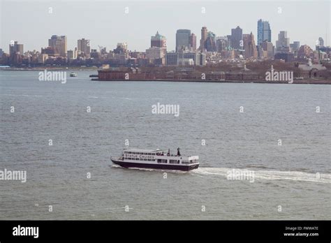 Statue Cruises passenger ferry taking tourists to the Statue of Liberty from Battery Park ,New ...