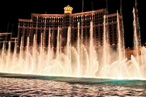 Bellagio and the singing fountain at night Photograph by Eti Reid