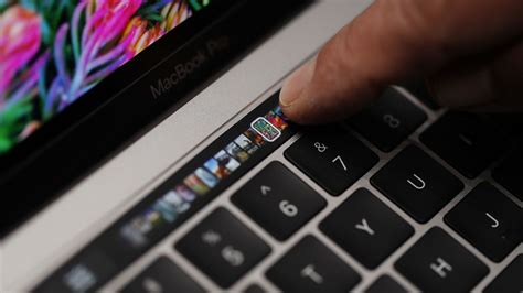 Apple is bringing a touchscreen to the MacBook Pro’s keyboard — and it ...