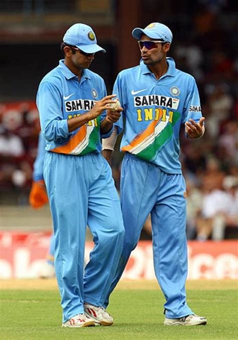 Rahul Dravid and Mohammad Kaif ponder a fielding position ...