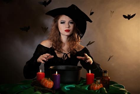 Premium Photo | Halloween witch on dark background