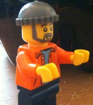 Which hand is this minifigure extending normally? - Bricks