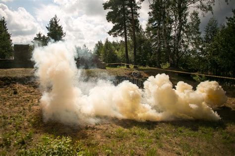 Orange army smoke bomb stock image. Image of hooligan - 75412413