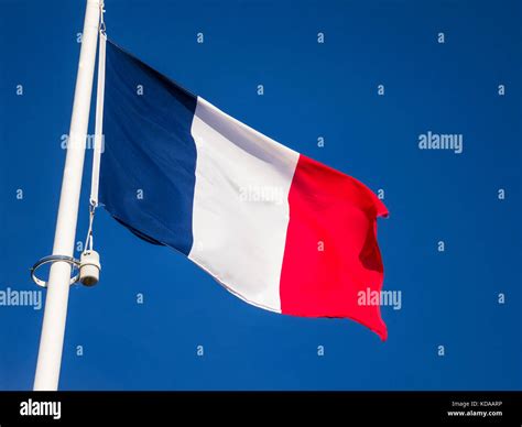 French Tricolour Flag National Flag of France flowing in the breeze against an uninterrupted ...