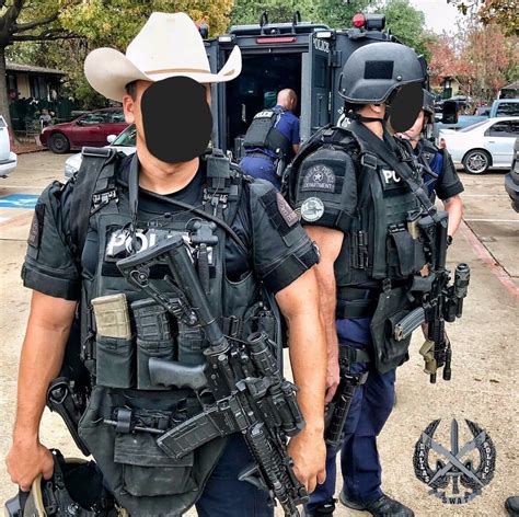 Only in Texas is a cowboy hat an appropriate part of a SWAT kit ...