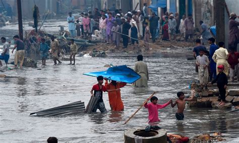 In pictures: Torrential rain floods Karachi, shatters records ...