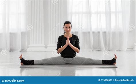 Side Splits Dance Pose By Woman Against Yellow Stock Image ...