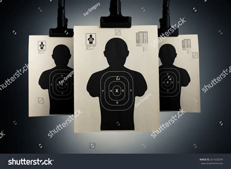 Shooting Targets Hanging On A Grey Background Stock Photo 261620294 : Shutterstock