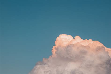 Fluffy pink cloud in sunset sky · Free Stock Photo