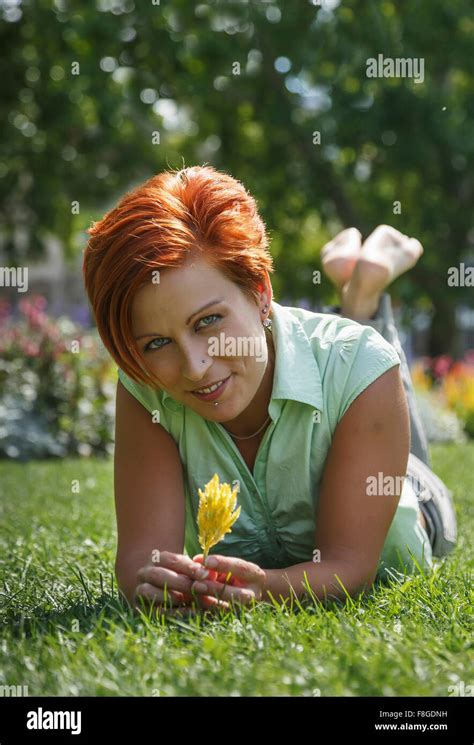 Barefoot woman grass hi-res stock photography and images - Alamy