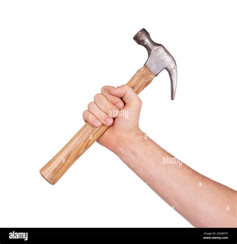 Man's hand holding hammer Stock Photo - Alamy