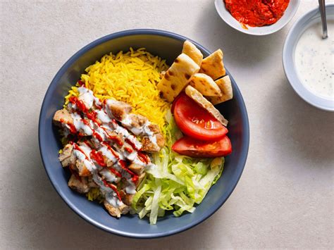 Is chicken over rice (with the white sauce) the same thing as Persian rice with the Kabob ...