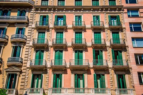 beautiful facades of traditional old historic spanish houses, windows ...