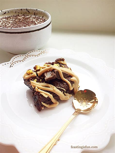 Caramac Drizzle Rolo Caramel Brownies - Feasting Is Fun