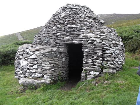 Corbelled roof "beehive hut" or clochán. Most of these structures in the Fahan area of the ...