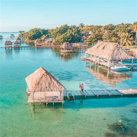 Aerial-View-Of-Couple-Embracing-On-A-Pier-In-Lake-Bacalar-Bacalar ...