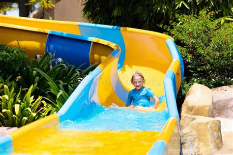 Kids on Water Slide in Aqua Park. Summer Vacation Stock Photo - Image of aquapark, little: 273883964