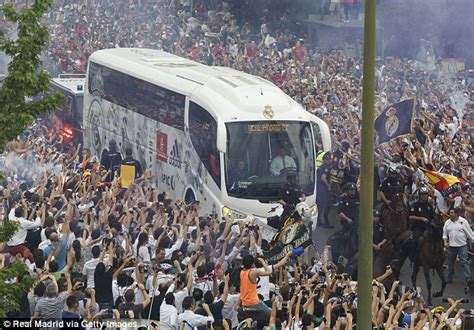 Real Madrid arrive to scenes of pandemonium outside the Santiago ...