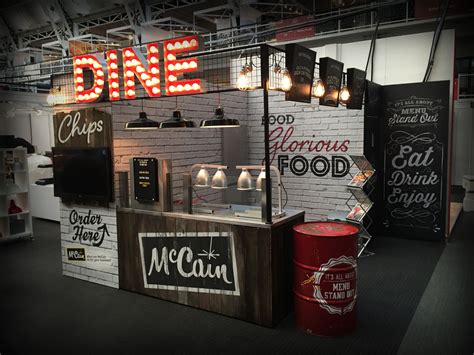 DINE exhibition for the casual show in London. sign writing goodwin & goodwin oil drum design ...