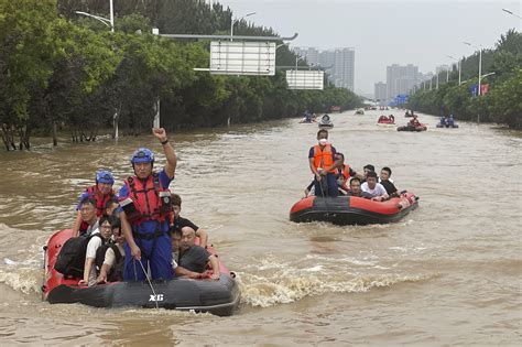 21 killed in floods as Beijing area sees heaviest rain in 140 years ...