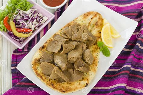 Donner Meat on Naan stock image. Image of sauce, purple - 31971275