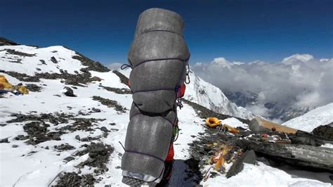 Sherpa guides rescue freezing climber from Everest 'death zone' in ...