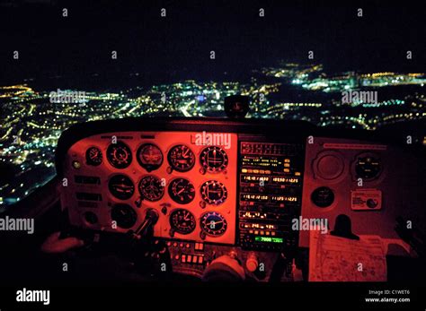 Night VFR flight in a small plane Cessna 172 over Luxembourg town Stock Photo - Alamy