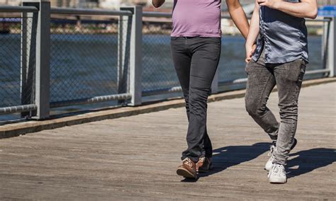 Couple Walking and Holding Hands · Free Stock Photo