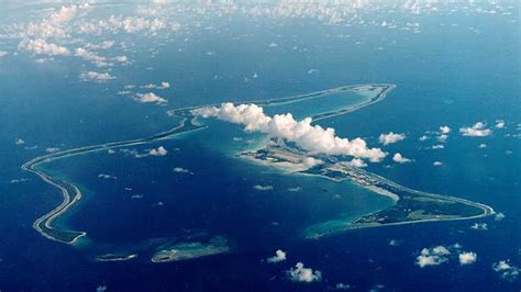 Chagos Islands: 'Emotional moment' as Mauritian flag raised on disputed British territory ...