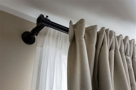 Do Curtain Rod And Grommets Need To Match? - housepursuits.com