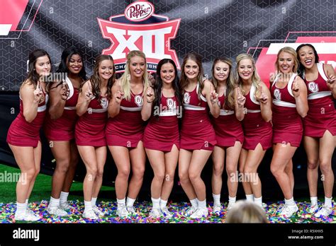 Oklahoma cheerleaders celebrate after the Dr. Pepper Big-12 ...