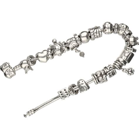 925 - Silver Pandora bracelet with 26 Pandora charms consisting of ...