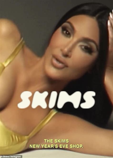 Kim Kardashian almost SPILLS out of her yellow silk negligee as she ...