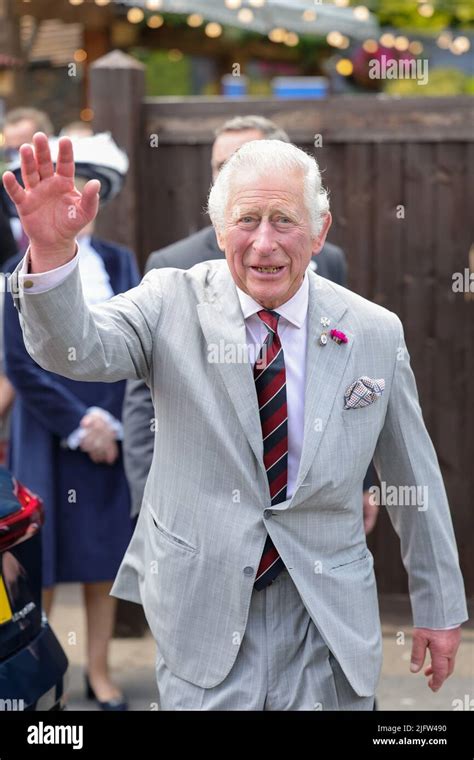 The Prince of Wales departs after a visit to Treorchy High Street ...