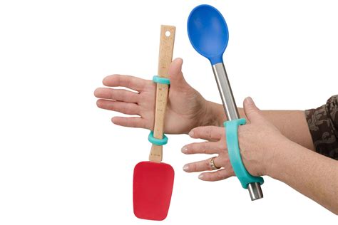 Cooking with EazyHold hand assitive device | Adaptive utensils, Hand ...