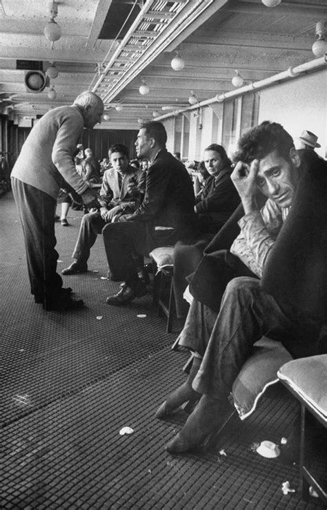 Survivors of the Andrea Doria on the deck of the SS Ile De France. 1956. Ile De France arrived ...