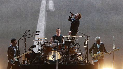 Bono says he gets 'embarrassed' listening to old U2 songs - 'most make ...