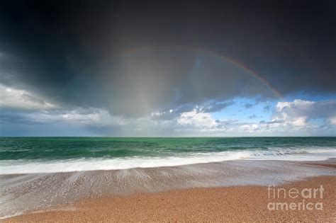 Beautiful Rainbow Over Ocean Waves Ob Sand Beach Photograph by Olha Rohulya