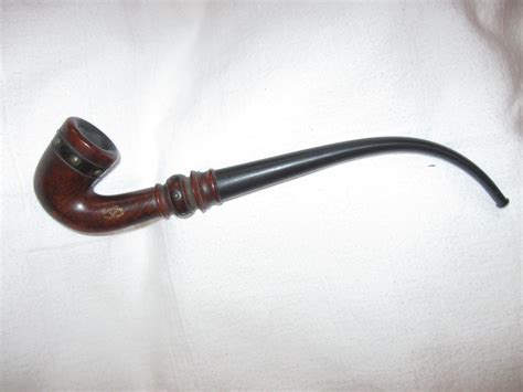 Antique long stem tobacco pipe. | Collectors Weekly