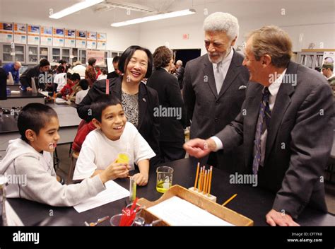 New Oakland, Calif. mayor Ron Dellums, second from right, watches as ...