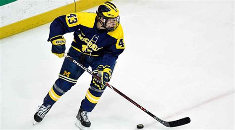 Quinn Hughes puts off Canucks contract, returns to Michigan - Sports ...