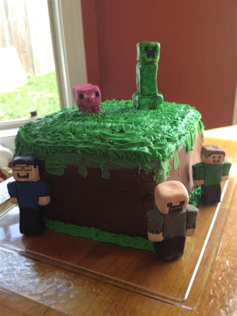 My son minecraft cake. A block of dirt with homemade creeper, steve ...