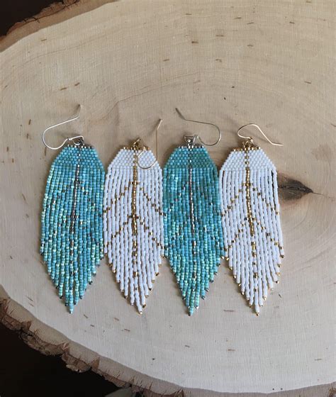 Feather silhouette earrings seed bead earrings beaded earrings | Etsy Hoop Earrings Diy, Denim ...