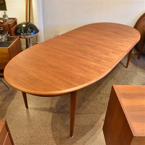 Danish Modern Teak Oval Dining Table with 2 Leaves | bananalab