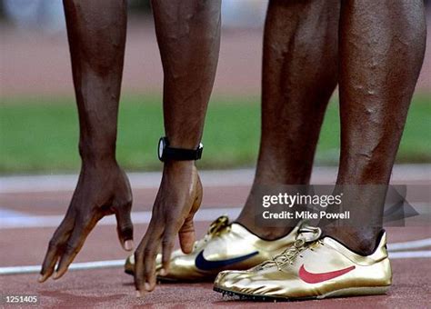 81 Michael Johnson Gold Shoes Photos & High Res Pictures - Getty Images