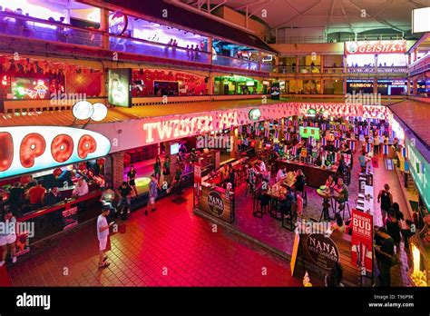 Nightlife in the red light district Nana Plaza, Bar, Bangkok, Thailand ...