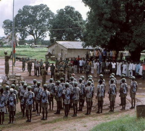 Guerrilla forces of the PAIGC raise the new flag of Guinea-Bissau in ...