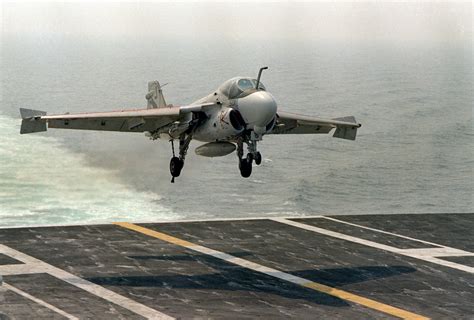 A front view of an A-6E Intruder aircraft coming in for a landing aboard the nuclear-powered ...