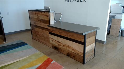 Embrace Rustic Elegance with a Custom-Made Reclaimed Wood/Steel Reception Desk